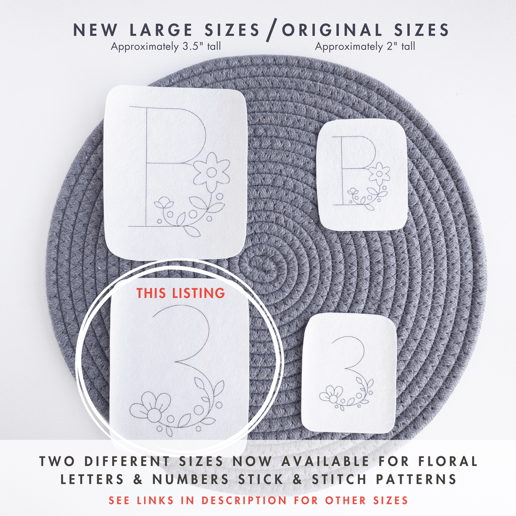 Two sizes of floral number and letter stick and stitch embroidery patterns on a gray mat.