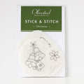 Christmas stick and stitch embroidery patterns on water-soluble stabilizer, featuring bells and a poinsettia.