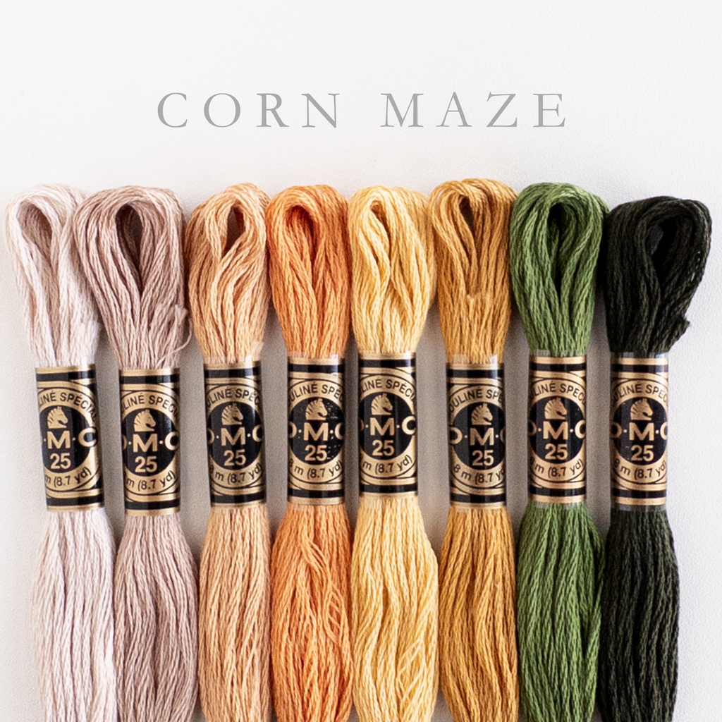 DMC Corn Maze embroidery floss bundle: 8 skeins of premium 6-stranded thread in warm beige, orange, yellow, and green.