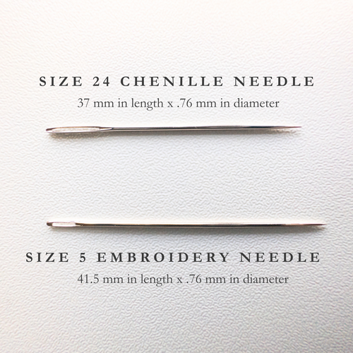 Two silver John James needles: a longer Size 5 embroidery needle and a shorter Size 24 chenille needle.