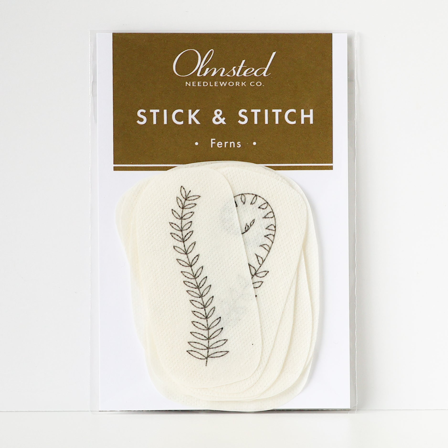Olmsted Needlework Co. Stick & Stitch Ferns pack with 12 water-soluble embroidery patterns.