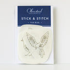 Folk Birds Stick & Stitch embroidery patterns on washaway stabilizer, featuring two cream-colored bird designs.