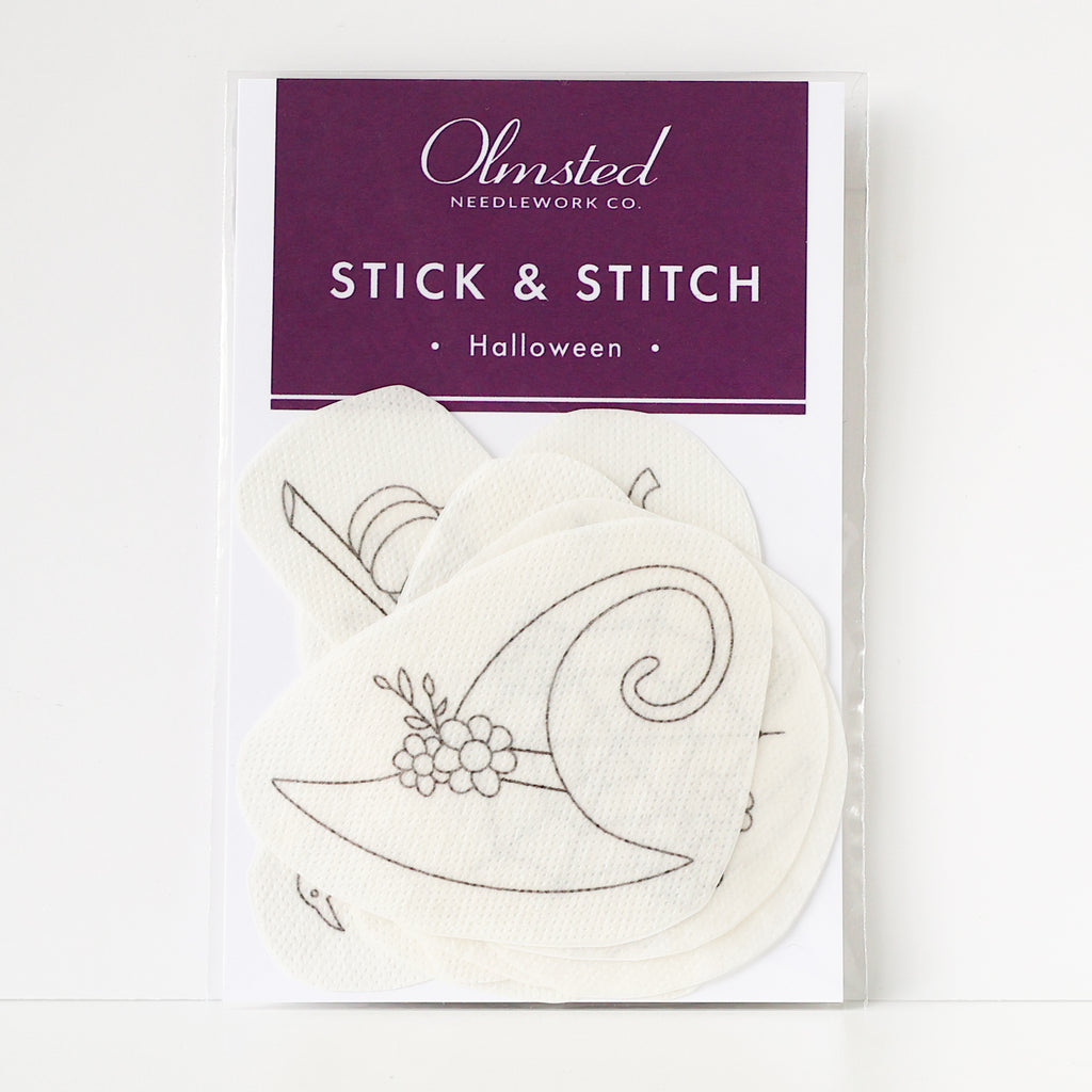Pack of Olmsted Needlework Co. Halloween Stick & Stitch embroidery patterns, featuring a witch hat design.