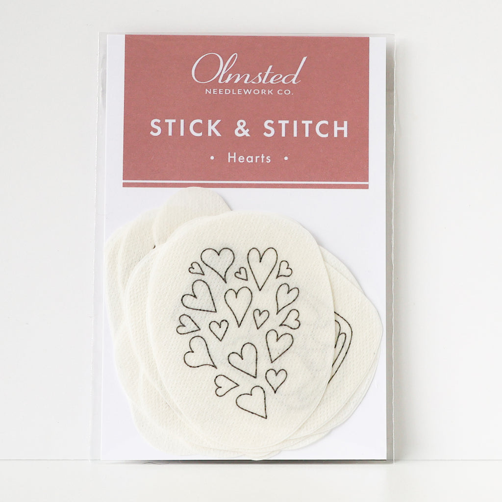 Olmsted Needlework Co. Stick & Stitch Hearts embroidery patterns on water-soluble stabilizer.