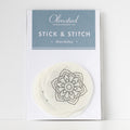 Olmsted Needlework Co. Stick & Stitch Mandalas pack with round, white, water-soluble embroidery patterns.