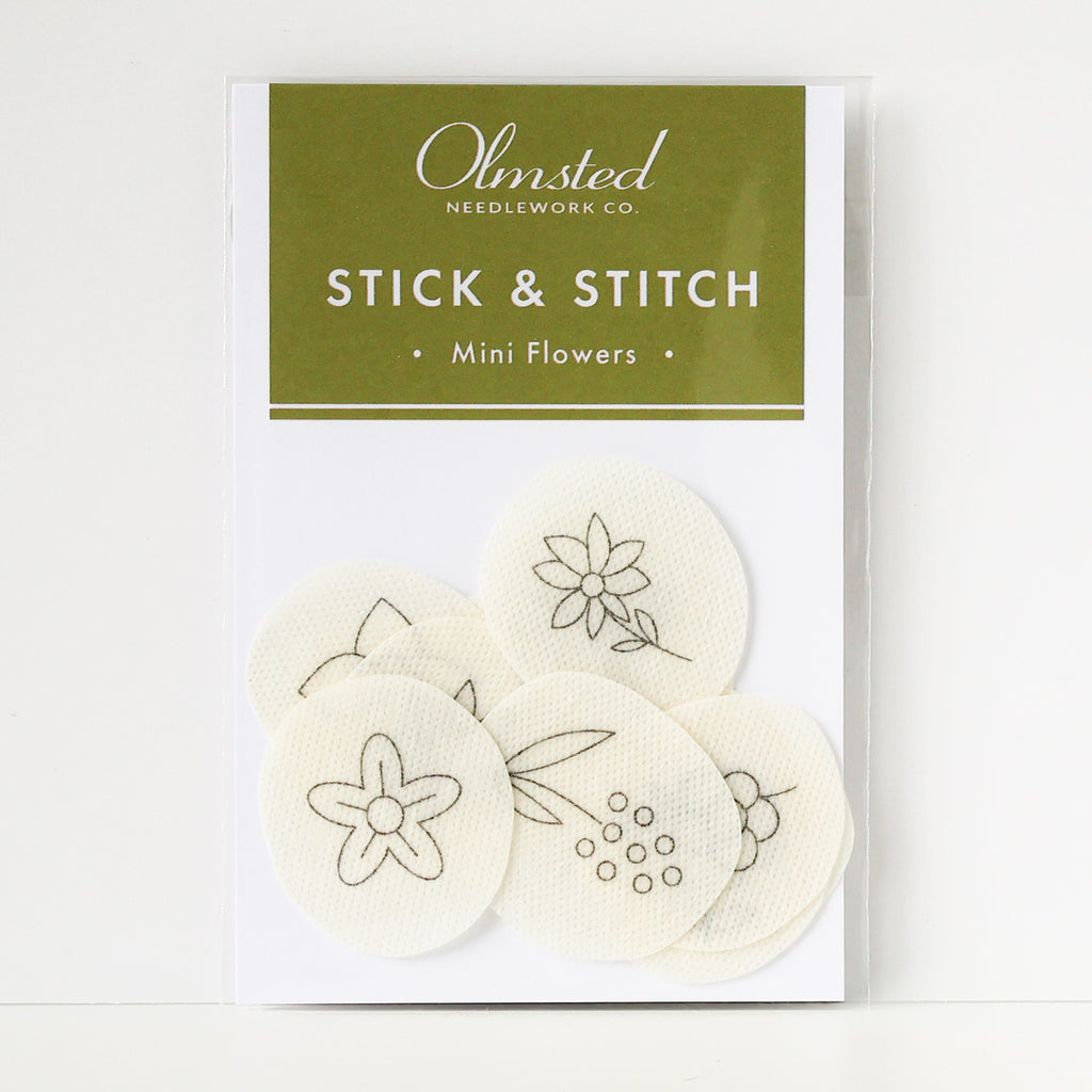 Olmsted Needlework Co. Stick & Stitch Mini Flowers: 12 small, round, water-soluble embroidery patterns.