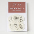 Olmsted Needlework Co. Stick & Stitch mini mushroom embroidery patterns on white water-soluble stabilizer patches.