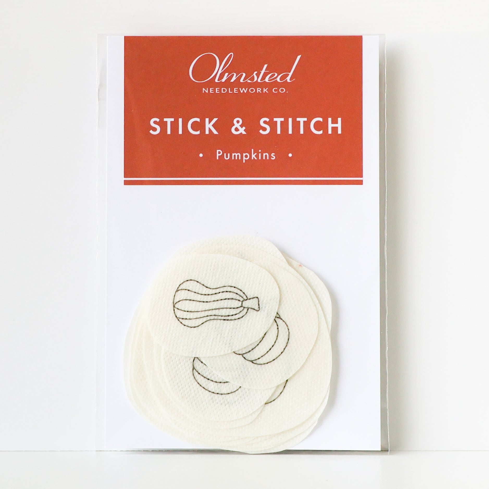 Olmsted Needlework Co. Pumpkin Stick & Stitch embroidery patterns on water-soluble stabilizer.